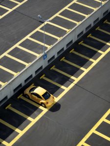 This parking bay is physically separated by a concrete barrier from the next parking bay, to prevent accidental collision whilst parking